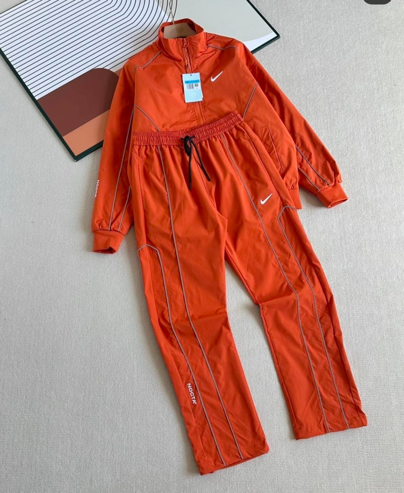 Nike x NOCTA Woven Tracksuit – Brilliant Orange